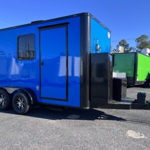 Blue Blackout Legacy Series 7x14 mobile pet grooming trailer with Flying Pig tub, K9 II dryer, electric grooming table, solar package, Boss stereo system, and generator power.