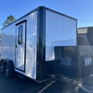 White 7x14 tandem axle Genesis Series mobile pet grooming trailer with .080 Polycore exterior, blackout trim package, 50" Flying Pig tub and professional interior setup