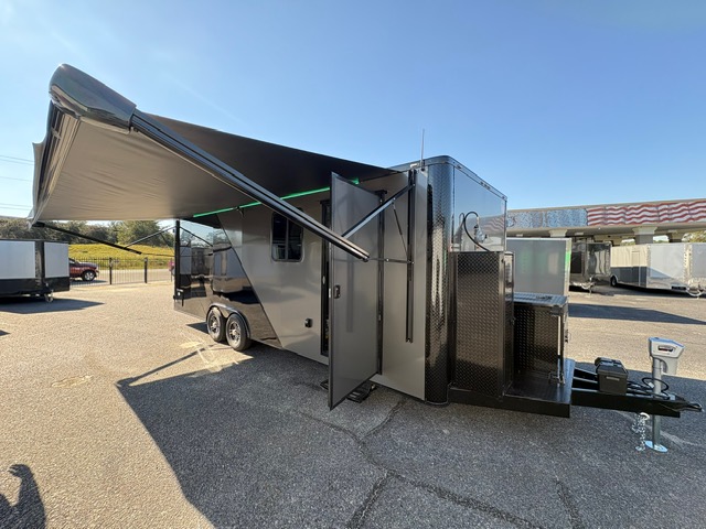 8.5x24 luxury mobile pet grooming trailer featuring dual grooming stations, private restroom, stainless steel kennels, electric awning, blackout package, and premium grooming equipment.