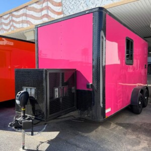 Pink Genesis Series 7x14 mobile pet grooming trailer with blackout trim, mag wheels, electric jack, generator box, and 75-gallon fresh water tank.
