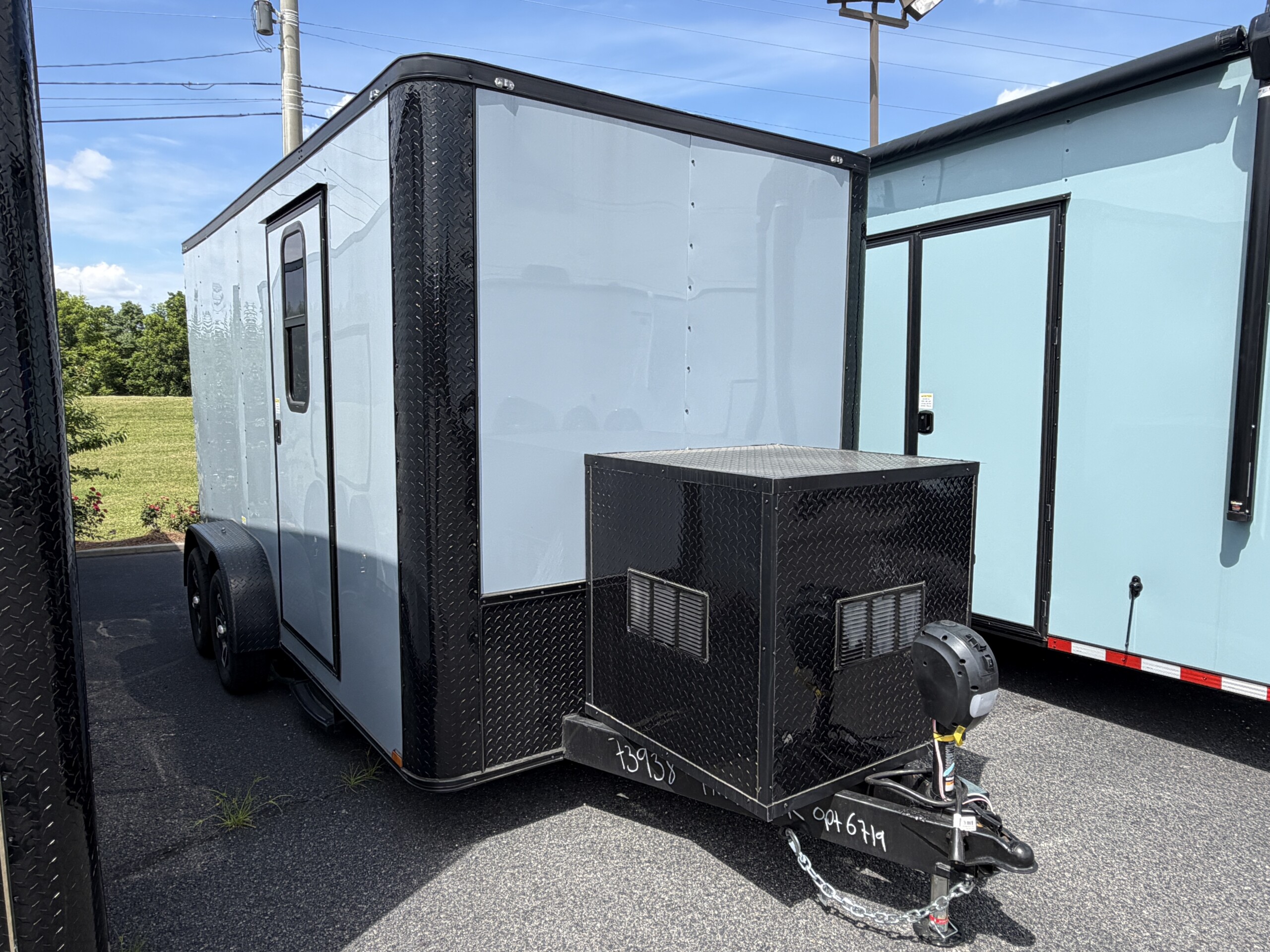 Polar Silver Genesis Series 7x14 mobile pet grooming trailer with blackout trim, mag wheels, electric jack, generator box with slideout tray, and wood-look flooring.